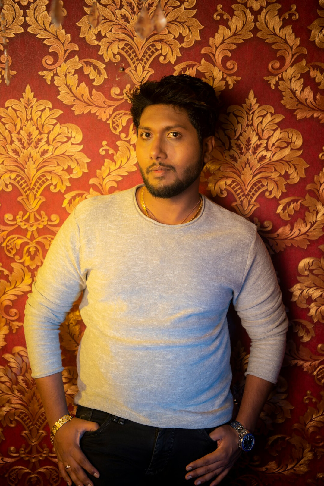 Portrait of a young man with a light beard looking at the camera