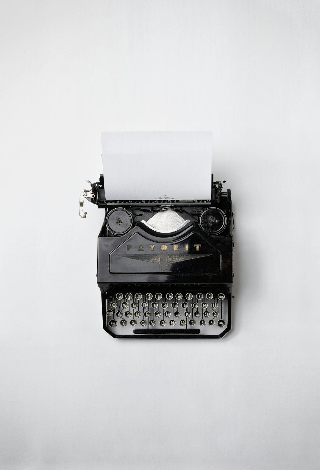 old typewriter with paper